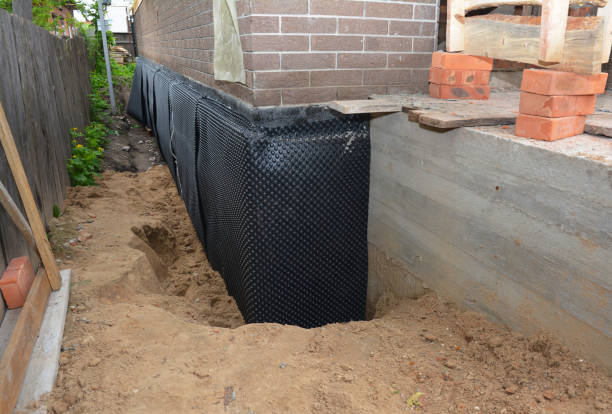 Happy homeowners after waterproofing job in Hopewell